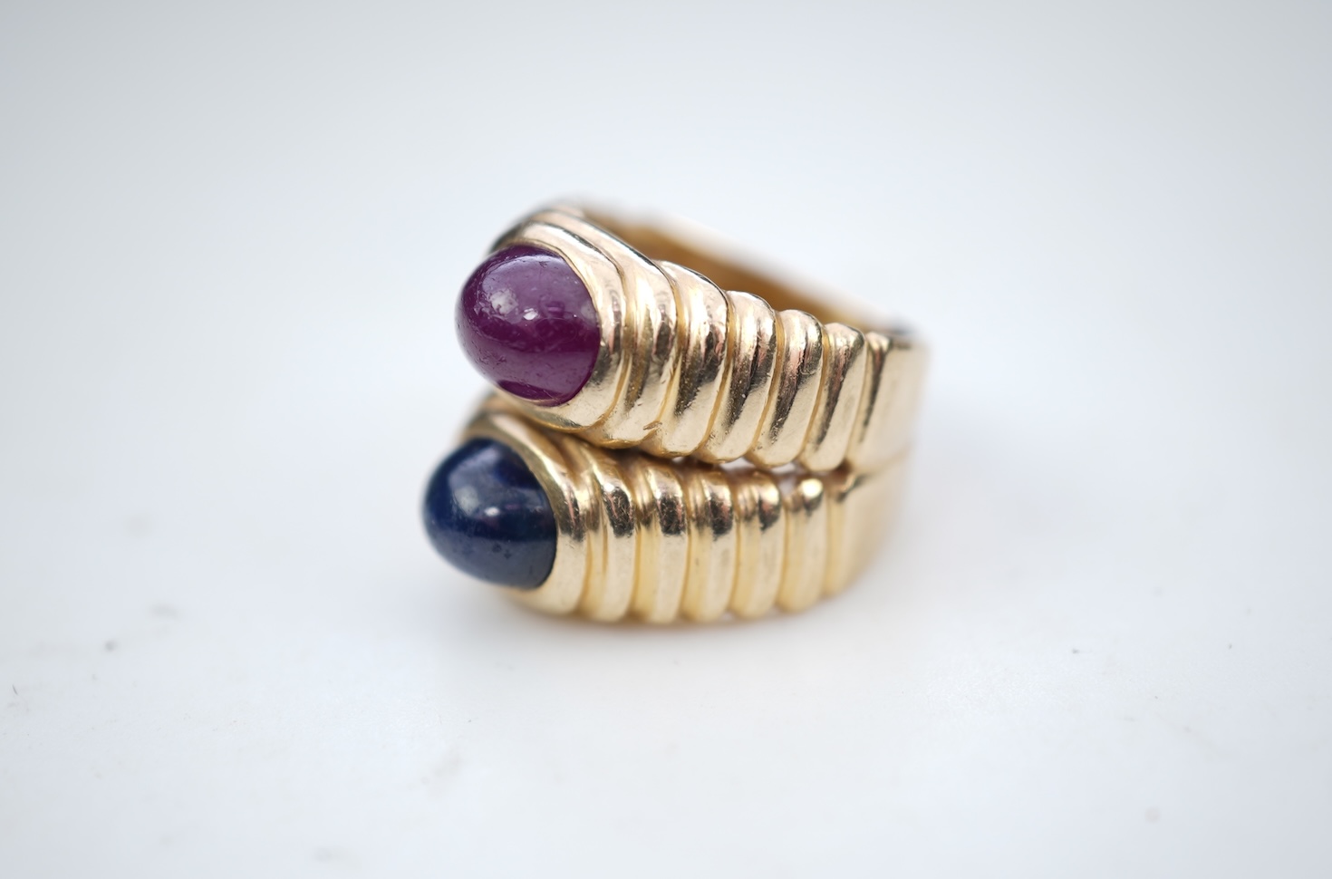 A sapphire and ruby ring